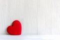 ValentineÃ¢â¬â¢s Day. Sewed pillow red hearts clothespins on the white wood planks. Happy lovers day card mockup, copy space